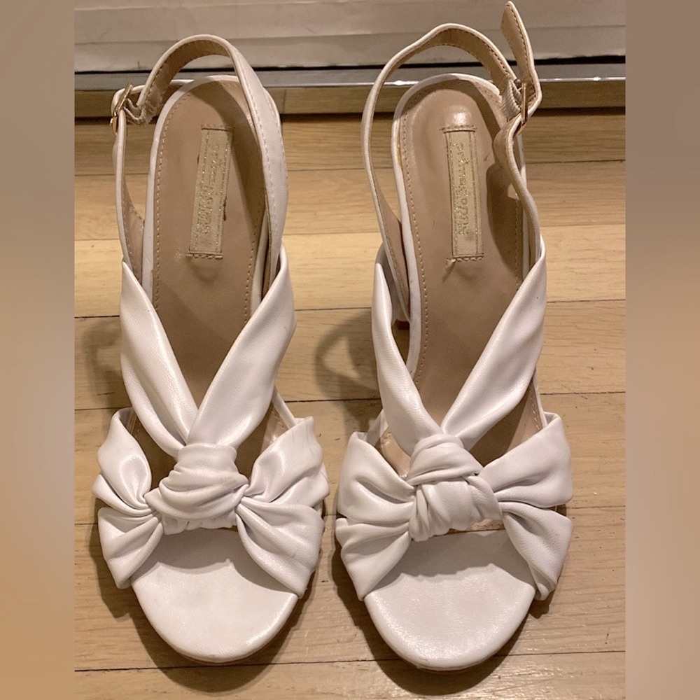 Bought straight from Italy! White 4 inch PU high heeled sandals.